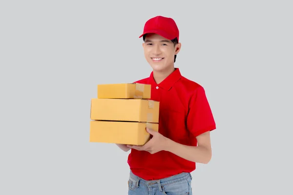Young Asian Man Uniform Red Cap Standing Carrying Box Stack — Foto Stock