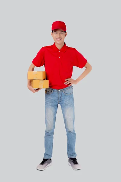 Young Asian Man Uniform Red Cap Standing Carrying Box Stack — ストック写真