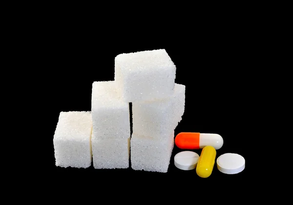 Sugar and medicines — Stock Photo, Image