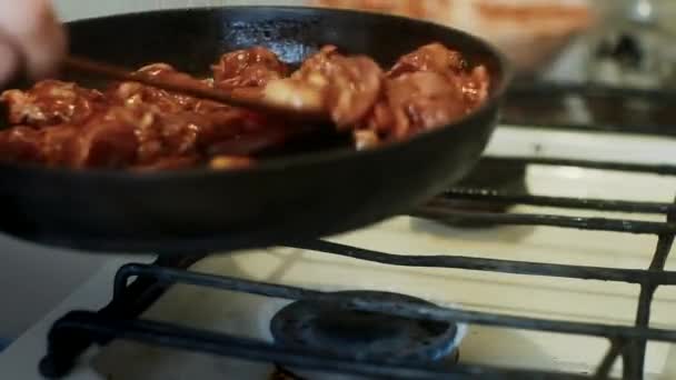 Lose Man Puts Pan Fries Meat Tomato Sauce Home Kitchen — Stock Video
