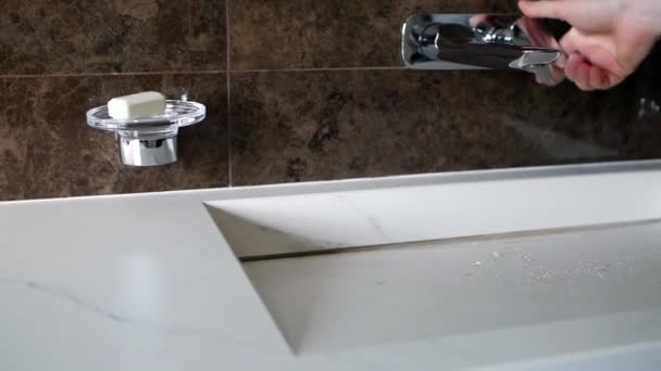 Man Hand Opens Tap Water Bathroom Closeup — Stock Video