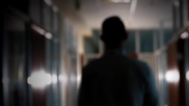 Young Man Walks Corridor Office Lighting Light Lamps Ceiling Office — Stock Video