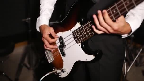 Close Video Playing Bass Guitar Guitarist Plays Musical Instrument Sound — Stockvideo