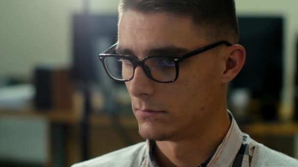 Close Video Portrait Young Man Wearing Glasses Working Computer His — Stockvideo