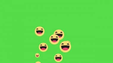 Mutlu emoticon gülümseme duygu emojisi yeşil arkaplandaki kareleri yükseltir. Yeşil ekrandaki çizgi film karakteri.