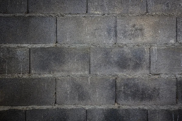 Achtergrond van concrete solide bakstenen muur — Stockfoto