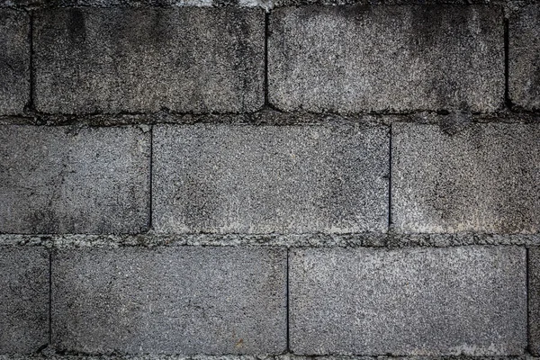 Achtergrond van concrete solide bakstenen muur — Stockfoto