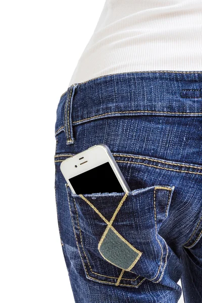 Mobiele telefoon in de achterzak van blue jeans — Stockfoto