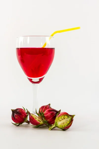 Hibiscus sabdariffa o frutas rosadas y zumo de rosa . —  Fotos de Stock