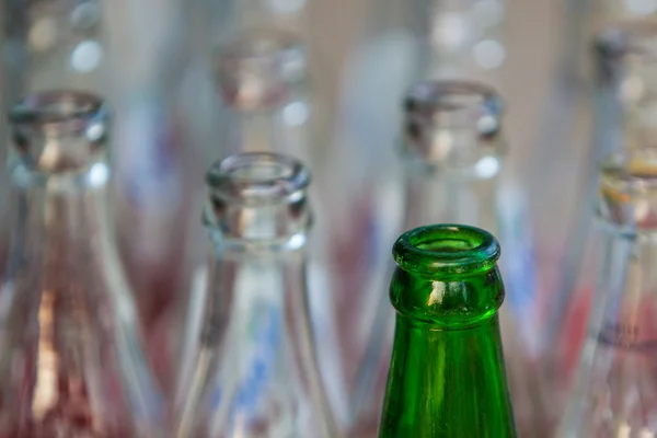 Empty green and white glass bottles. — Stock Photo, Image