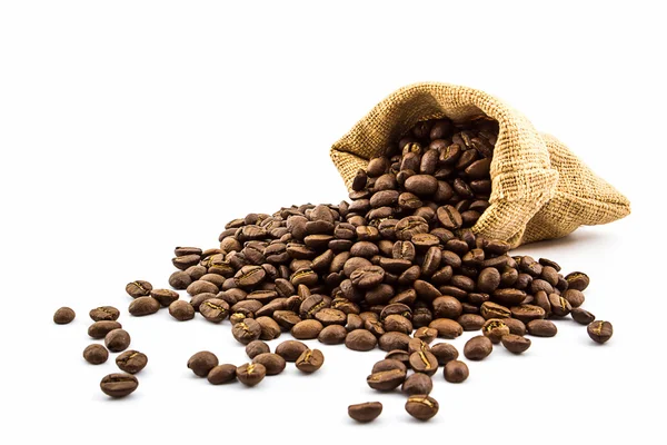 Brown rostade kaffebönor i en duk säck. — Stockfoto