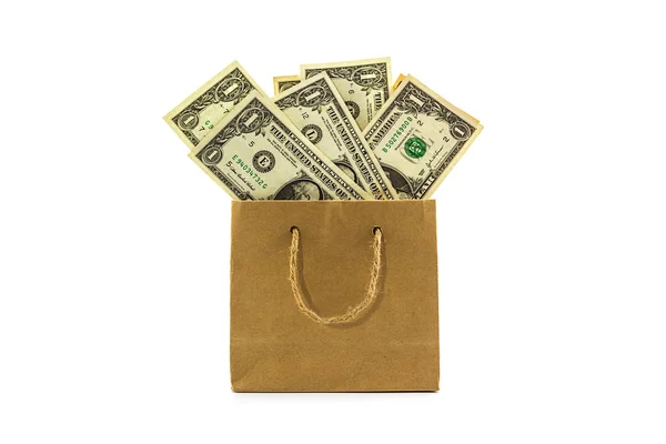 Banconote in dollari in sacchetto di carta marrone . — Foto Stock