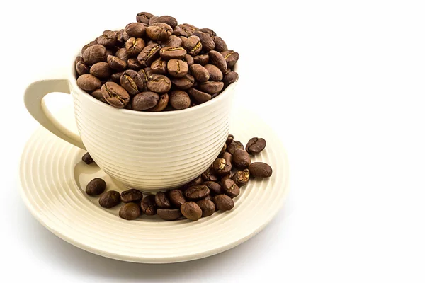 Brown roasted coffee beans in coffee cup — Stock Photo, Image