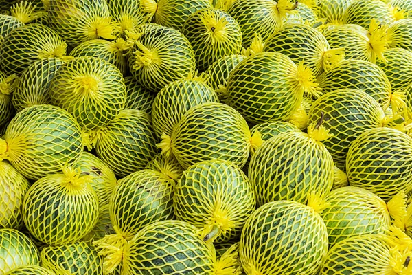 Stack of watermelon in yellow shockproof. — Stock Photo, Image