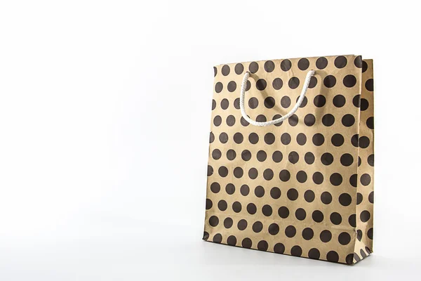 Brown polka dots paper bag. — Stock Photo, Image