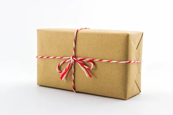 Cardboard carton wrapped with brown paper. — Stock Photo, Image