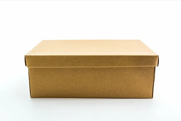Коробка для обуви коричневого цвета на белом фоне . — стоковое фото