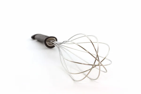 Metal whisk for whipping eggs, House ware. — Stock Photo, Image