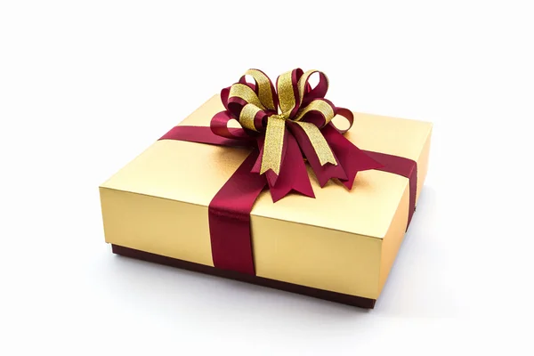 Gold und braun Geschenkbox mit Schleife. — Stockfoto