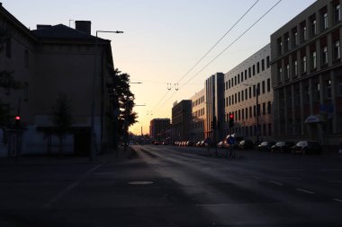 Empty street in the city at sunrise