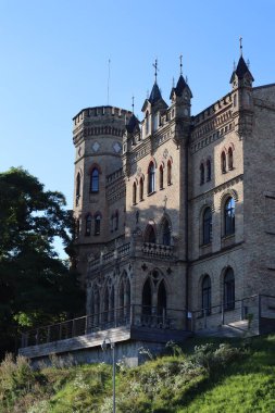 View of the old building, roofs in the sun