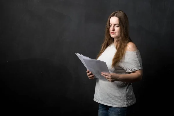 Woman Holds Her Hands Reads Sheets Paper Teacher Background Slate — Stock Photo, Image