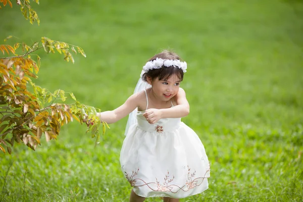 Little cute girl in white dress — Stock Photo, Image