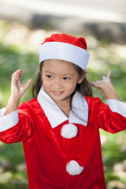 küçük kız soyunma Noel Baba olarak zevk