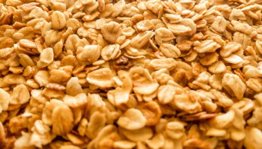 Yakın plan granola, kahvaltı tabağı, yulaf ezmesi ve bal.