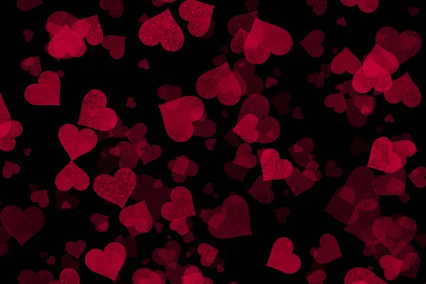 Textura bokeh corações vermelhos no fundo preto. Modelo com corações bokeh para seus projetos — Fotografia de Stock