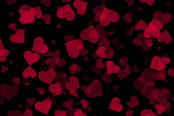 Red hearts bokeh texture on black background. Template with hearts bokeh for your projects — Stock Photo, Image