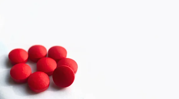 Selective focus, group of red medical pills isolated on white background.Health and medicine concept — Stock Photo, Image