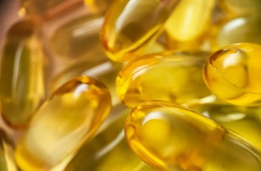 Birçok Omega 3 kapsülünün yakın çekim dokusu. Çoklu doymuş yağ asitleri. Sağlıklı yaşam tarzı kavramı