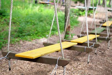 Rope park, obstacle course in the amusement park.