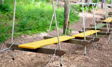 Rope park, obstacle course in the amusement park.
