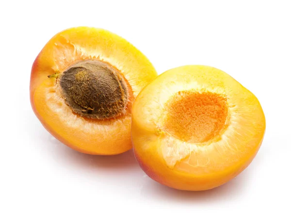 Two apricot halves with stone close-up — Stock Photo, Image