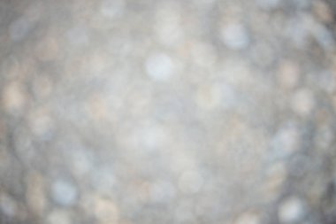 Gri ve koyu tonlu lens efektiyle tamamen bulanık bir görüntü. Grafik tasarımı için arkaplan.