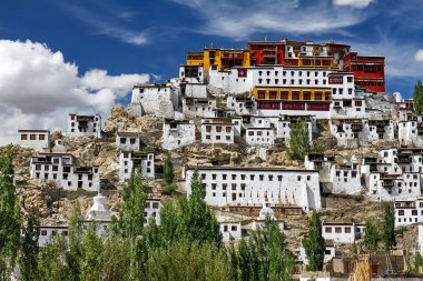 Thiksey Monastery in Clouds and Deep Blue Sky Close Shot, India clipart