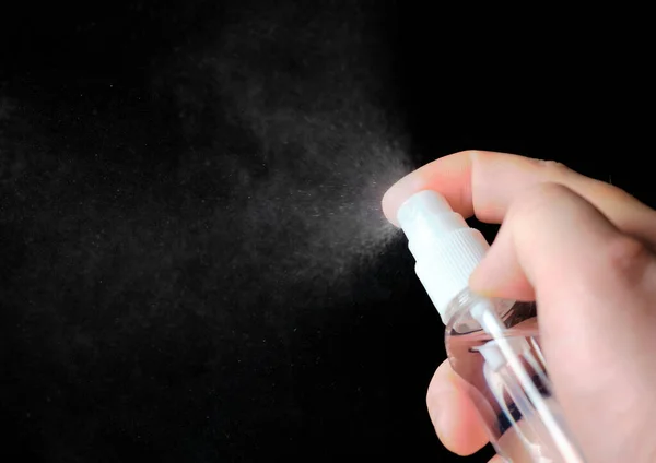 Hand Sprays Sanitizer Black Background — Stock Photo, Image