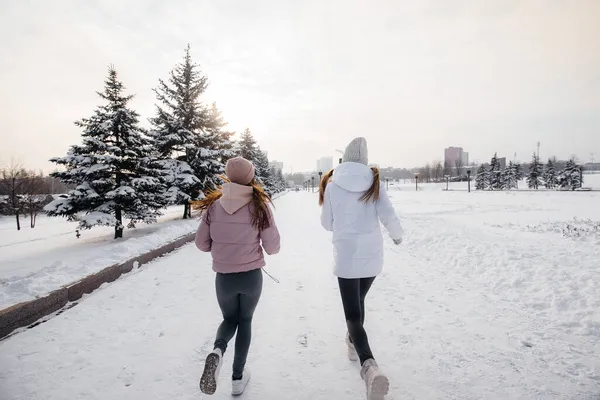 Two Young Athletic Girls Running Park Sunny Winter Day Healthy — Stock Photo, Image