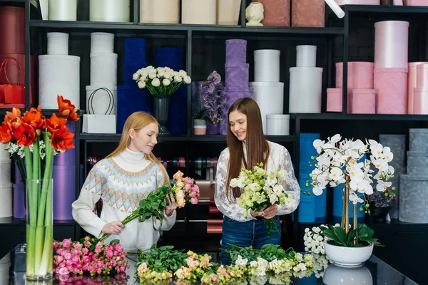 Two Young Women Take Orders Phone Make Beautiful Festive Bouquets Royalty Free Stock Photos