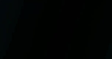 Havada yüzen gerçek toz parçacıkları. Toz Parçacıkları Arkaplanı. Makro yavaş çekim, karıştırma kipi kullan (ekran)