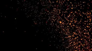 Gece gökyüzündeki büyük ateşten yanan kırmızı kıvılcımlar yükseliyor. Ateş, ışık ve yaşam temasının güzel soyut arkaplanı.