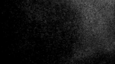 Havada yüzen gerçek toz parçacıkları. Toz Parçacıkları Arkaplanı. Makro yavaş çekim, karıştırma kipi kullan (ekran)