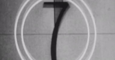 Black and White, Monochrome Universal Countdown Film Leader. Countdown Clock from 10 to 0. Effect of old film rolling with details, scratches, markers and grain. Negative reel. Film Burn 4K FX Effect