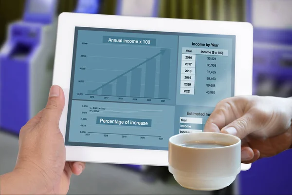 Someone Hand Holding Digital Tablet Showing Business Annual Income Graph — Stock Photo, Image
