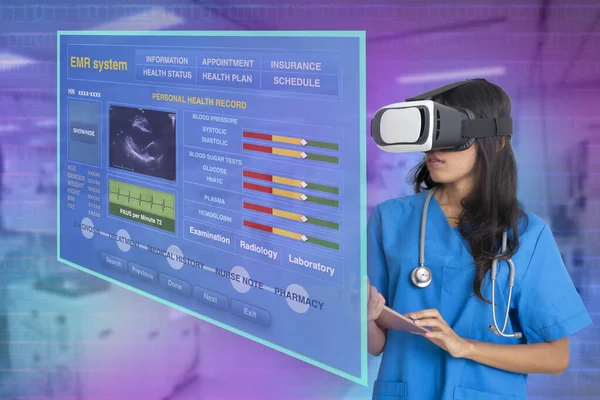Female doctor wearing 3D virtual reality glasses using virtual electronic medical record to find patient information.