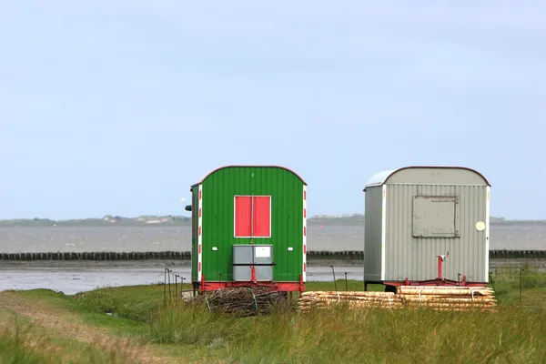 Werknemers of migranten caravan aan de kust Stockafbeelding