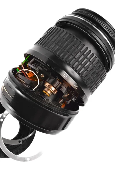 Broken plastic zoom lens isoletaed on white — Stock Photo, Image