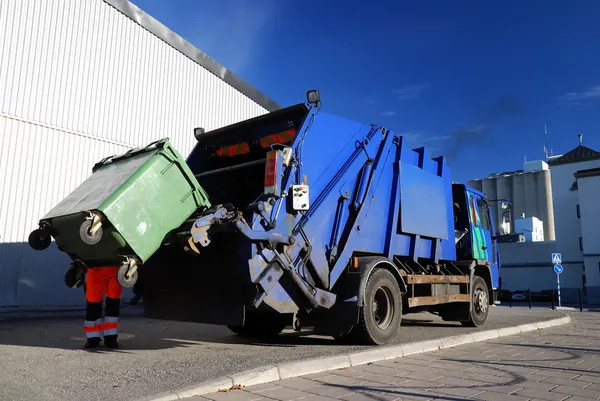 Garbage transport car loading itself in port. Landfill site, ecology, environmental damage, pollution, infrastructure, industry, special equipment, reuse, recycle, zero waste concept. Sweden — Stock Photo, Image